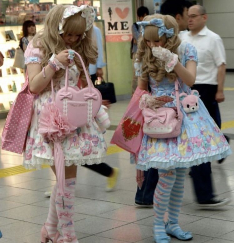 Two OTT sweet Lolitas, one in pink and the other in blue