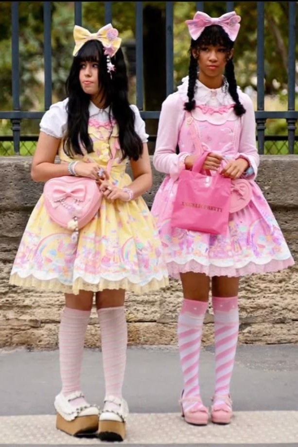 Two sweet Lolitas, one in yellow and th other in pink