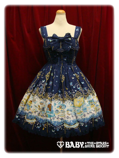 Navy dress with white, yellow, and light blue border print